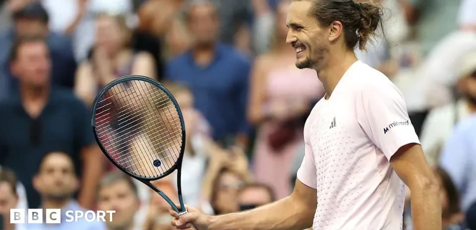 Player celebrating with racket during tennis match