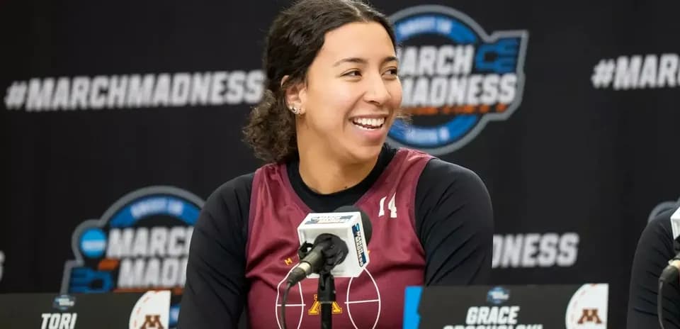 Tori McKinney smiling at March Madness press conference