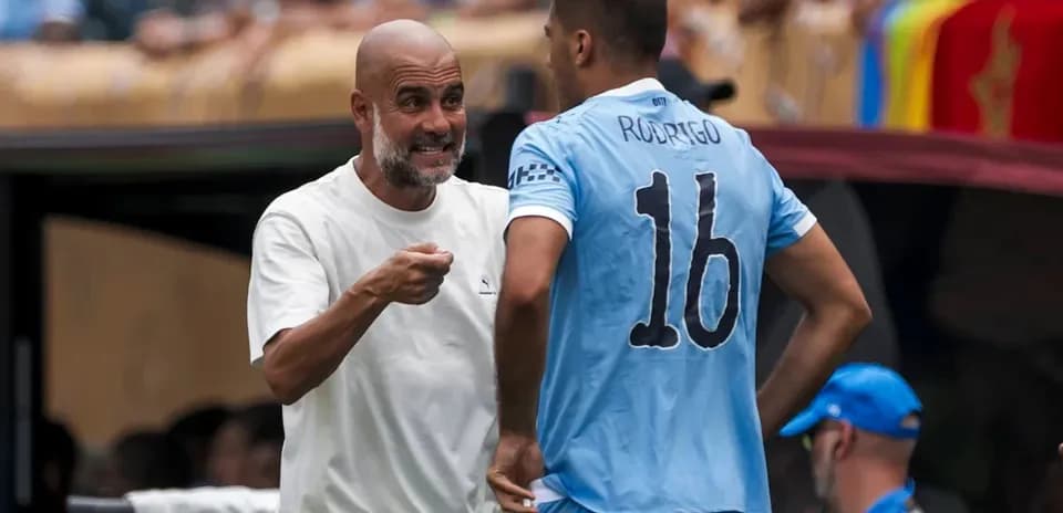 Manager giving instructions to player during match