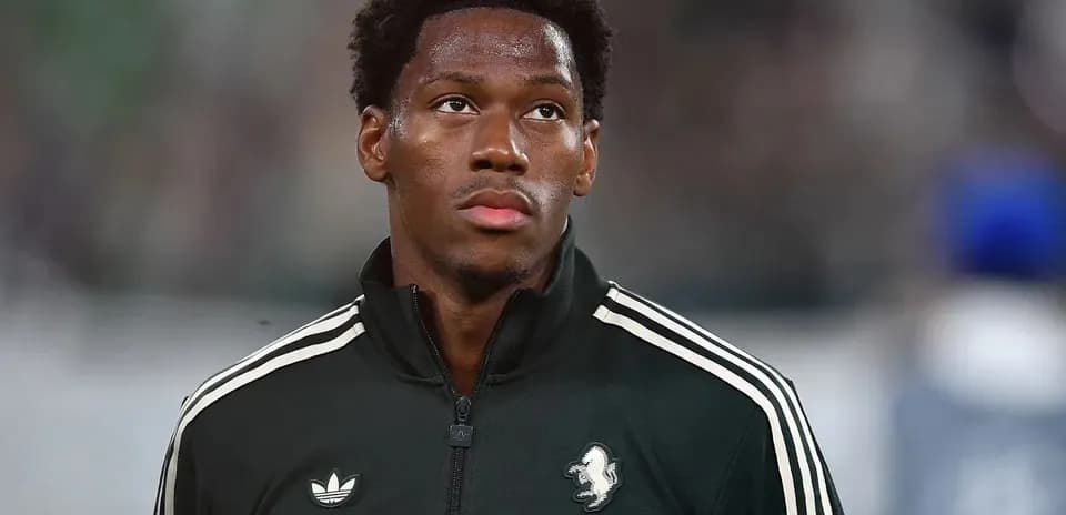 Player in warm-up jacket before match