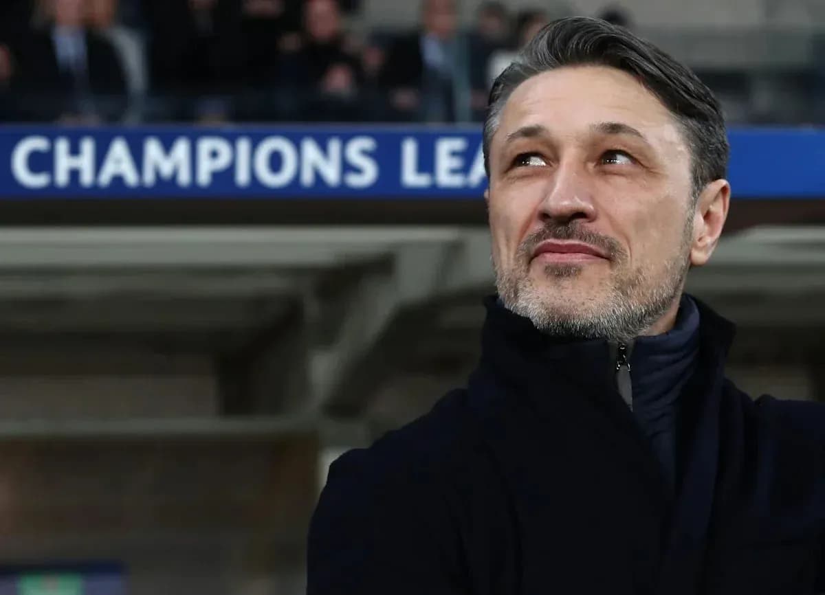 Coach looking up during Champions League match