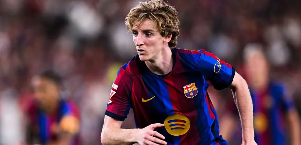 Player in FC Barcelona kit running during match