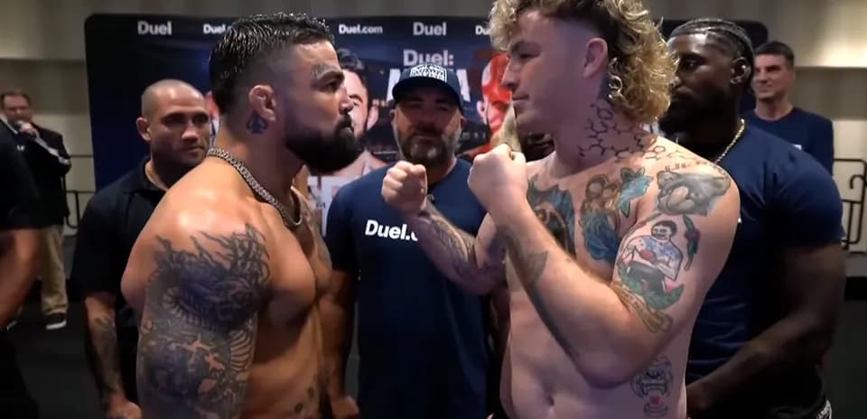 Two fighters face off at weigh-in event