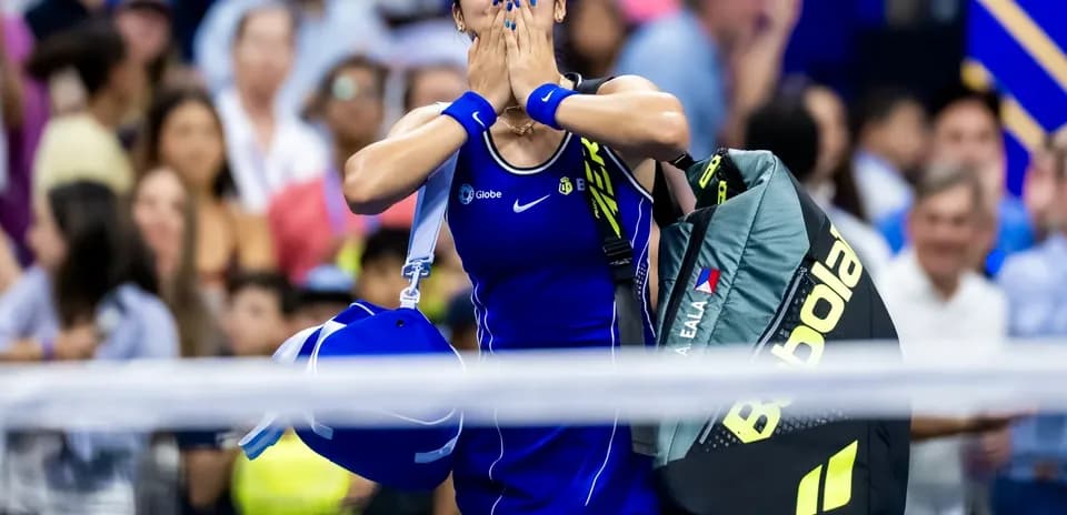 Tennis player celebrating after match victory