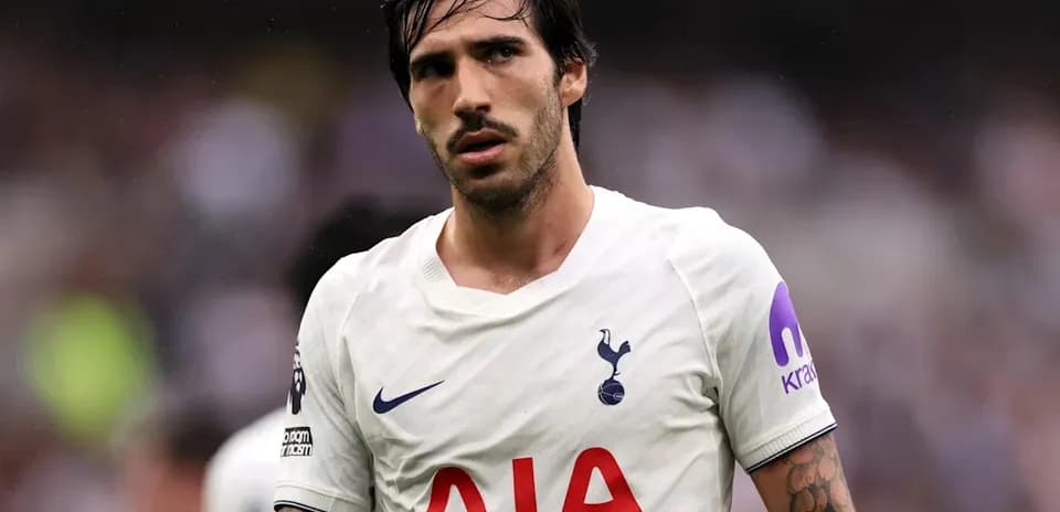 Tottenham player during match with focused expression