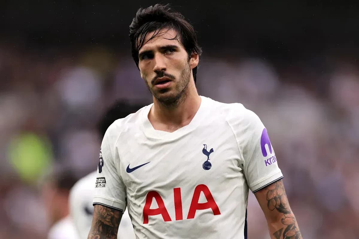 Tottenham player during match with focused expression