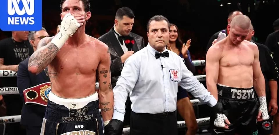 Boxers in the ring after championship match conclusion