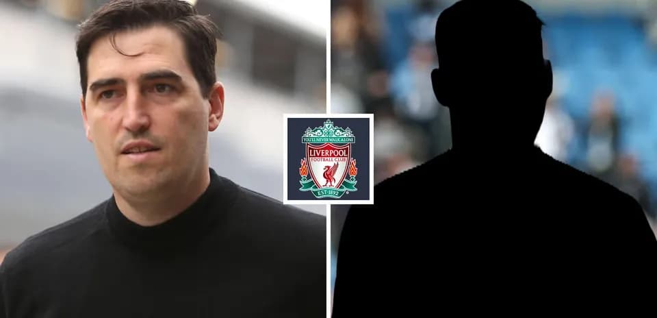 Person walking with Liverpool logo in background