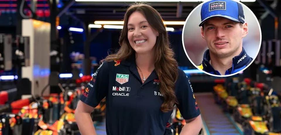 Female team member posing in Red Bull Racing garage