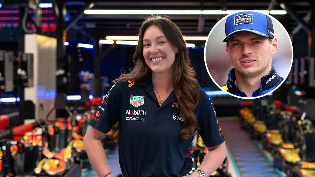 Female team member posing in Red Bull Racing garage