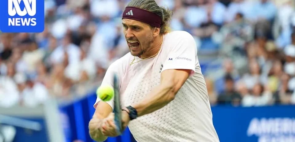 Player hitting a tennis ball during a match