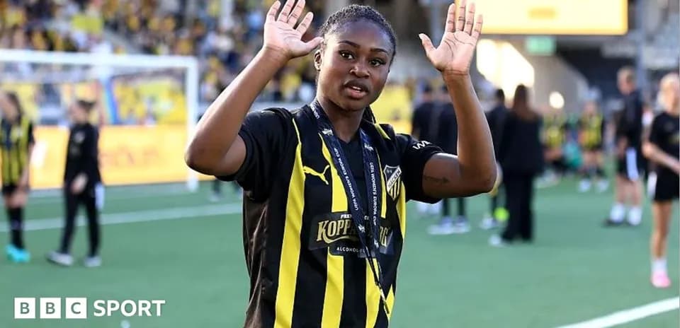 Player waving to fans after match celebration