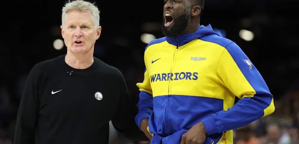 Coach and player discussing strategy on the court