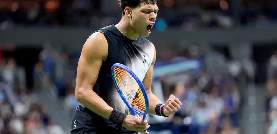 Tennis player celebrating during a match