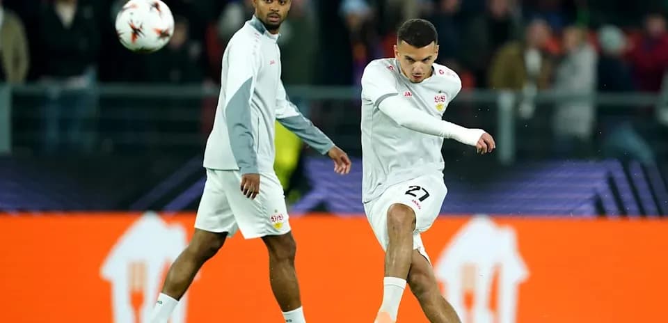 Player kicking ball during warm-up before match