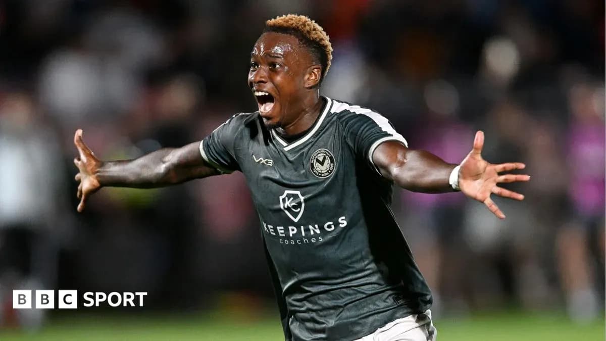 Player celebrating a goal with outstretched arms