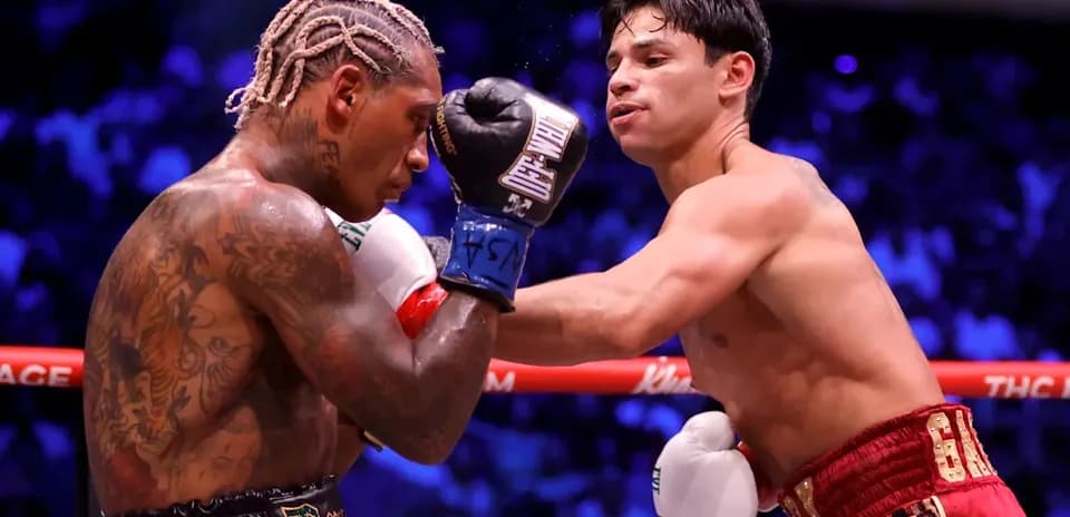 Boxers exchanging punches in the ring during match