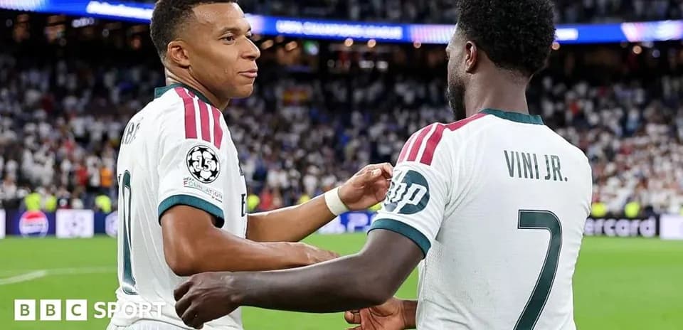 Mbappé and Vini Jr. celebrating on the field