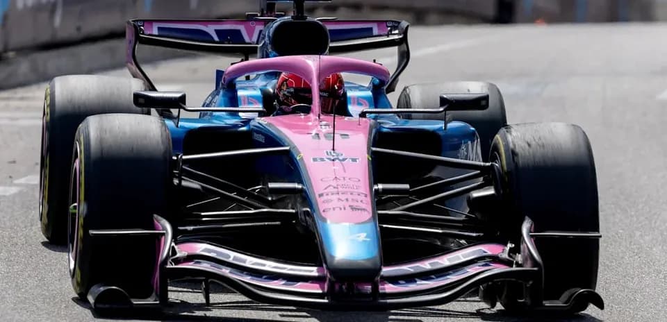 Racing car competing on track during event