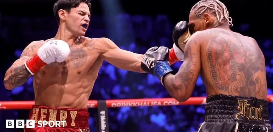 Boxer throwing a punch during match action