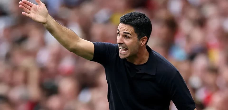 Manager directing players during a football match