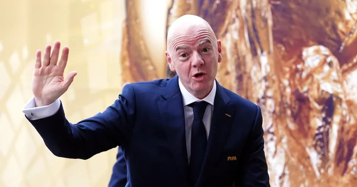 FIFA official gesturing during an event