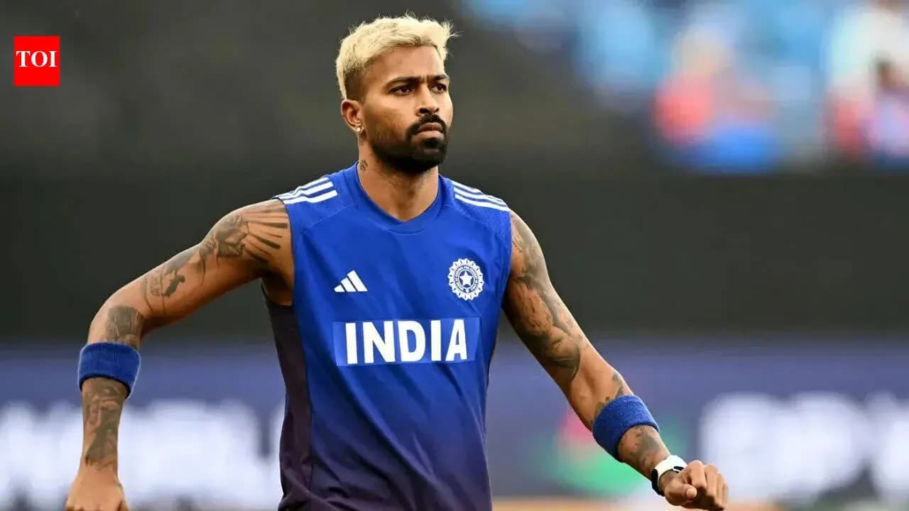 Cricketer in India jersey warming up before match