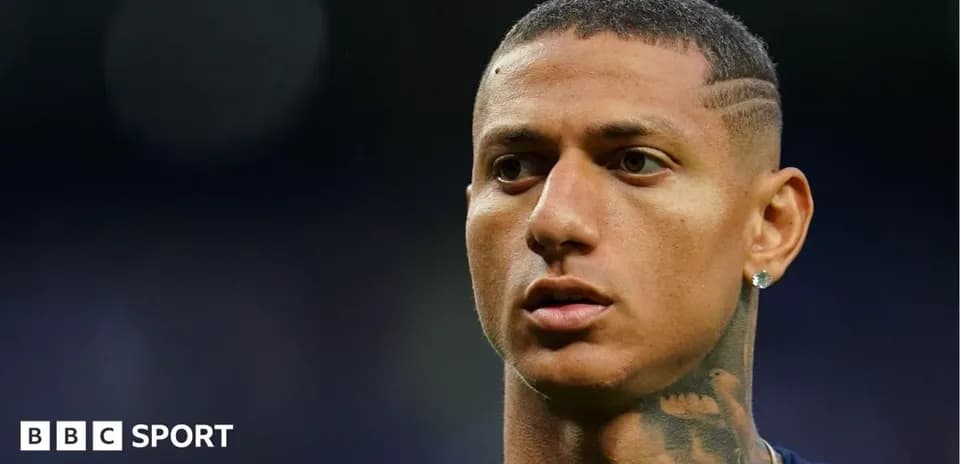 Player with short hair and tattooed neck