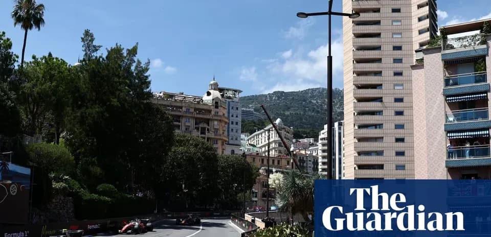 Formula 1 cars racing through Monaco street circuit