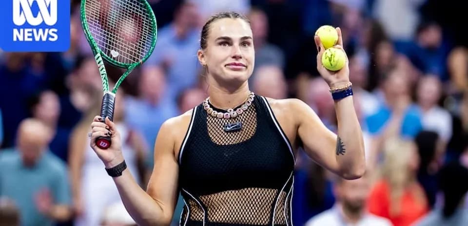 Player holding two tennis balls and racket