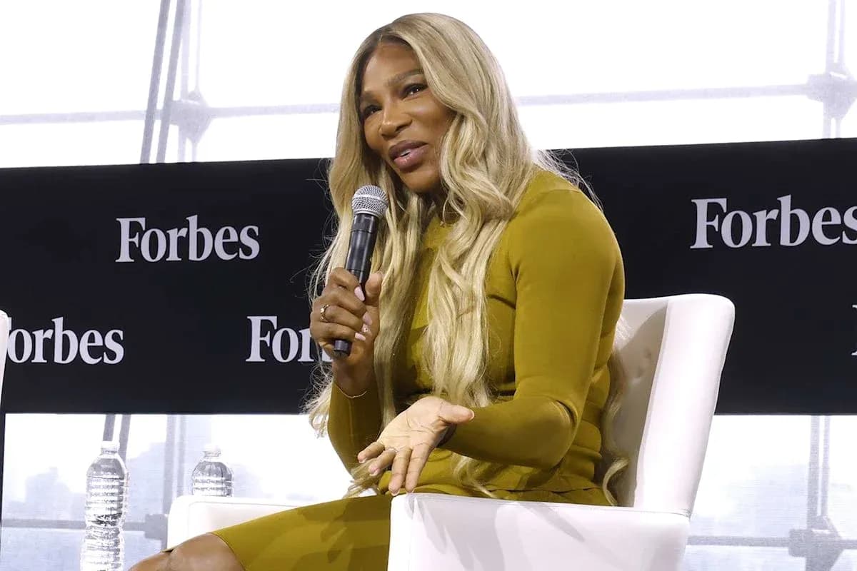 Speaker discussing at Forbes event on stage