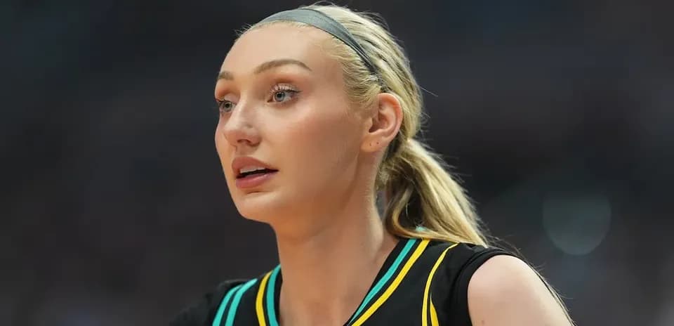 Female basketball player in team uniform during game