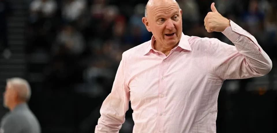 Man gesturing during basketball game on court