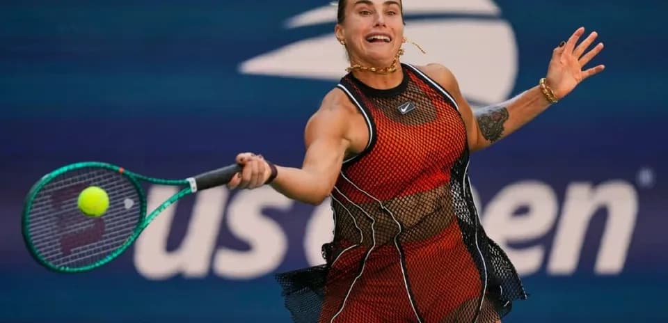 Player hitting a tennis ball during a match