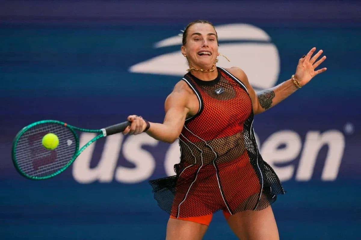 Player hitting a tennis ball during a match
