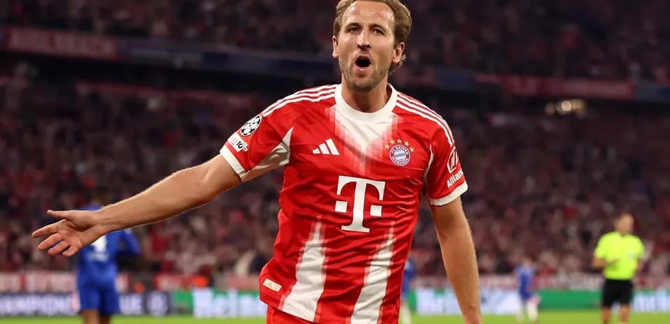 Bayern Munich player celebrating a goal in stadium
