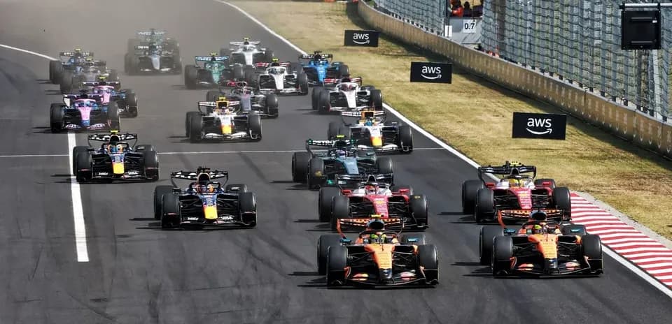 Formula 1 cars racing on track during event