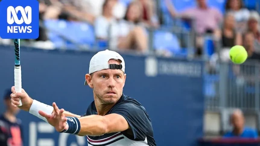 Tennis player hitting a forehand shot during match
