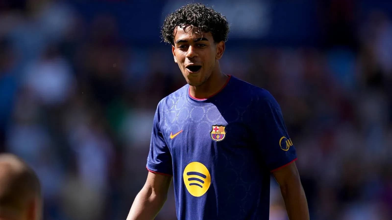 Player celebrating in FC Barcelona match uniform