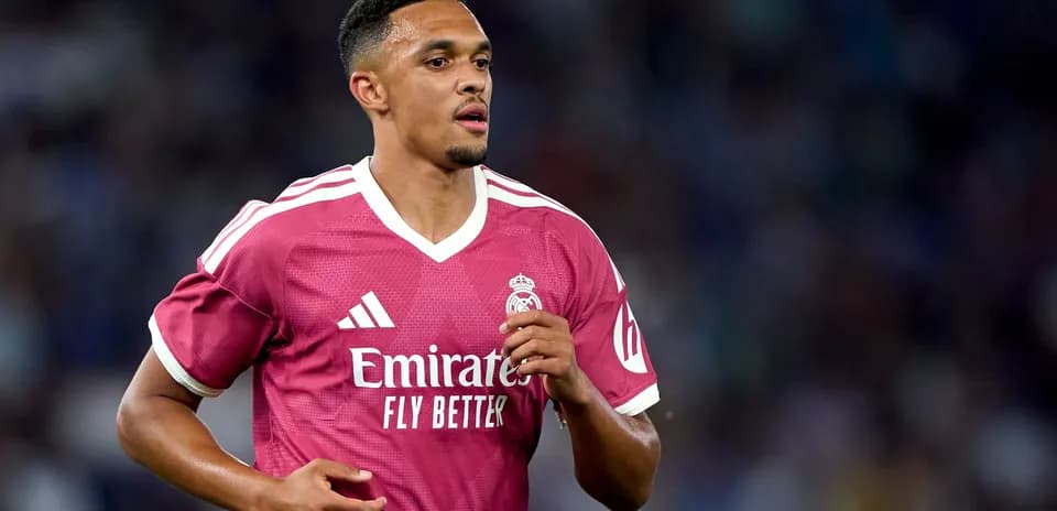 Player in pink Real Madrid jersey during match