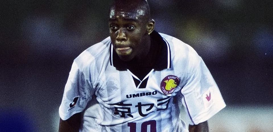 Player in action wearing Kyoto Purple Sanga jersey