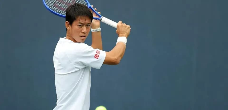 Tennis player preparing to hit a backhand shot