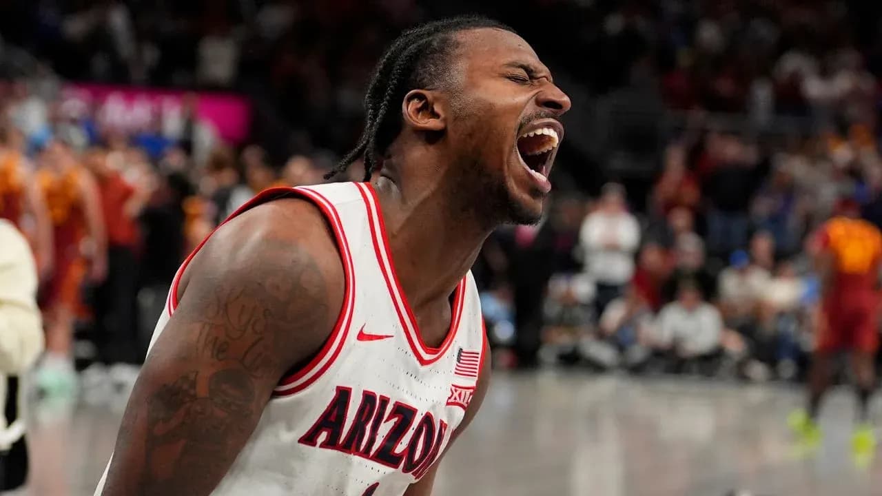 Player celebrating during a college basketball game