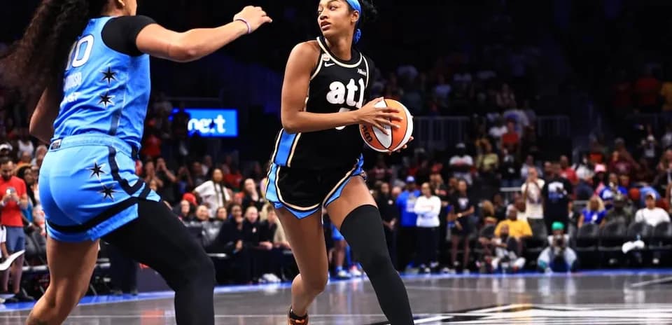 Player dribbling ball during basketball game action