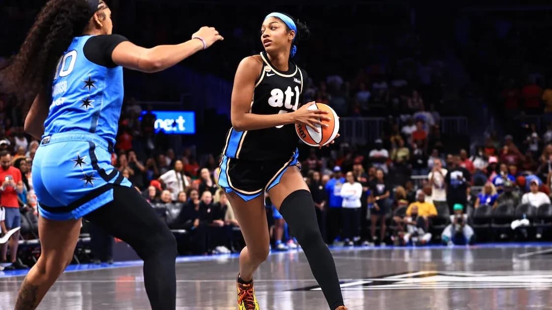 Player dribbling ball during basketball game action
