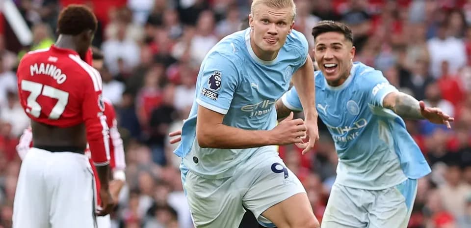 Manchester City players celebrating a goal during match