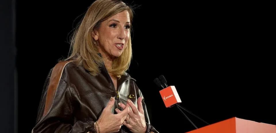 Woman speaking at podium during event