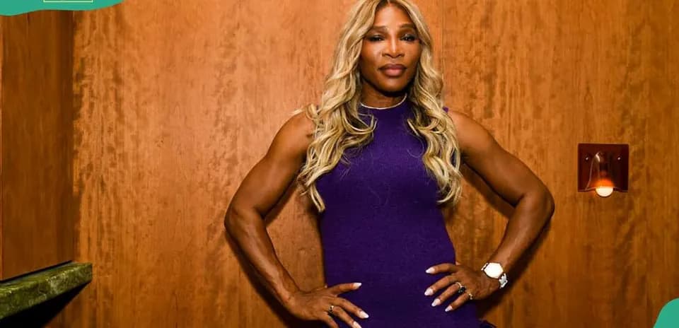 Athlete posing confidently in purple dress