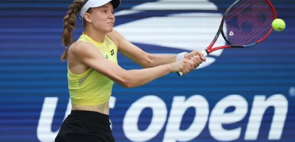 Player hitting a tennis ball at US Open