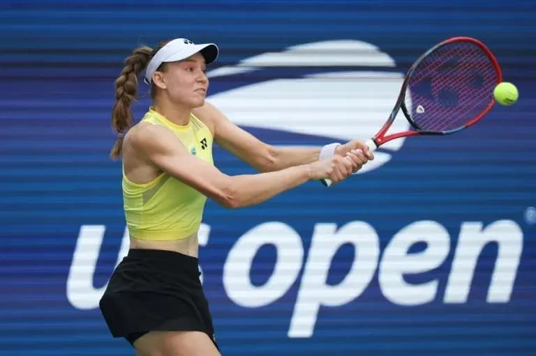 Player hitting a tennis ball at US Open
